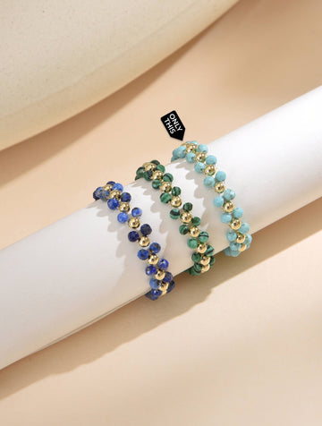 Elastic Bracelet Made with Sky Blue Crystals and Golden Beads-Rings-Peling